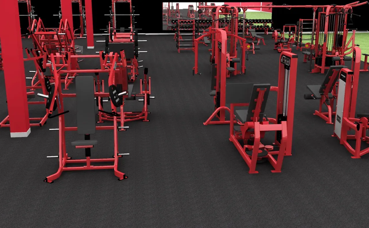 Red Hammer Strength selectorized machines arranged on dark gym floor
